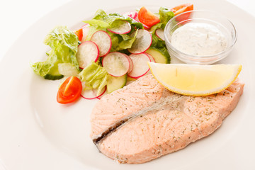 salmon steak with salad