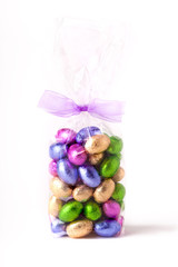 Chocolate mini eggs in a cellophane bag