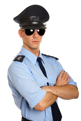 Portrait of young policeman on white background