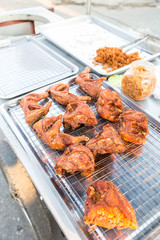 Fresh, hot, crispy fried chicken for sale in local market