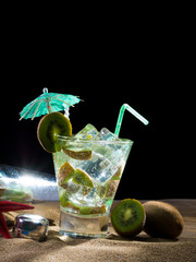 Kiwi cocktail on the sand