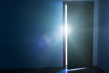 Open door with bright light outside