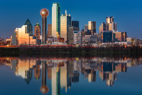 Dallas skyline reflected in Trinity River at sunset