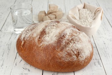 Composition with rye bread on wooden background