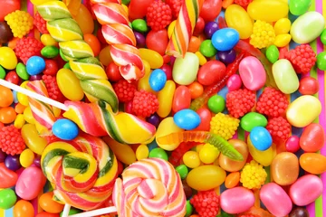 Küchenrückwand glas motiv Different colorful fruit candy close-up © Africa Studio