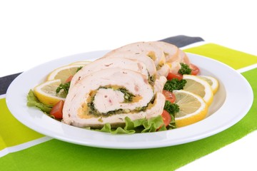 Delicious chicken roll on plate on table close-up