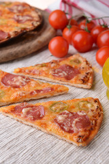 Tasty pizza on table close-up