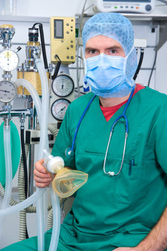 anesthesiologist with anesthetic machine
