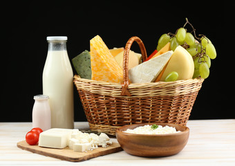 Basket with tasty dairy products