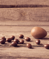 Chocolate Easter Eggs Over Wooden Background