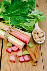 Rhubarb on board with sugar and cinnamon