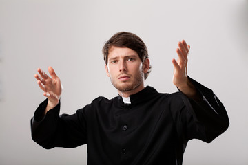 Priest is preaching a sermon
