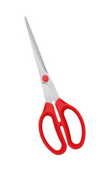Red scissors on fabric isolated on white
