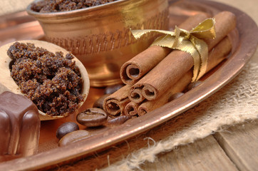 Brown sugar, cinnamon sticks and coffee beans, chocolate candy