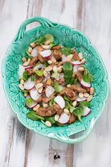 Above view of a glass dish with indonesian salad