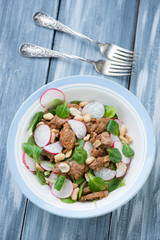 Above view of a plate with indonesian salad, vertical shot