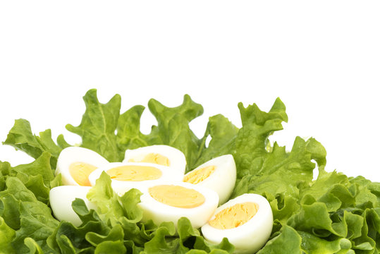 gekochte Eier mit Salat, Eigelb