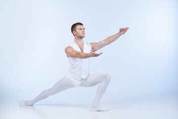 attractive male dancer posing and acting.