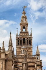 Fototapeta na wymiar La Giralda Bell Tower of Seville Cathedral in Spain