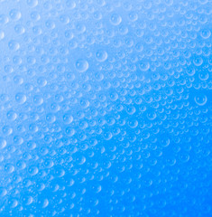 Water drop on color background