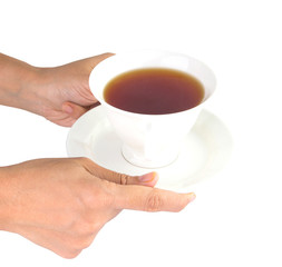 Female hands serving a cup of tea