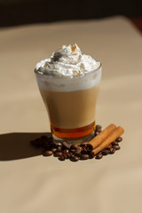 Image of tasty cup of coffe with cream