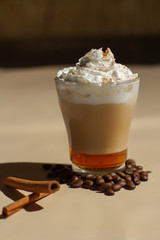 Image of tasty cup of coffe with cream