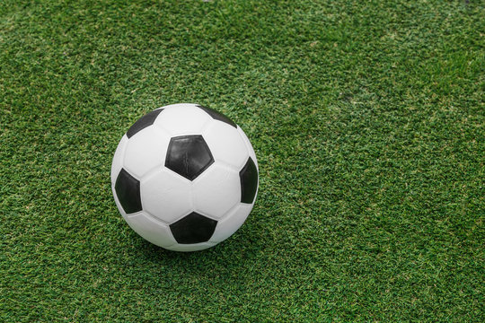 soccer ball on artificial turf