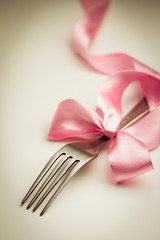 Fork  with decorative ribbon.