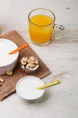 Yogurt with cashew nuts and juice
