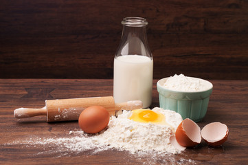 Flour, eggs and a bottle of milk