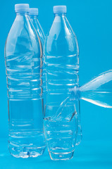 Pouring water into a glass