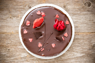 Chocolate cake decorated with  hearts