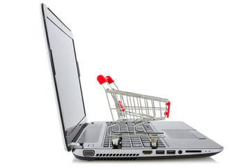 Shopping cart and laptop