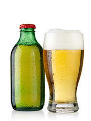 Small beer bottle and a glass