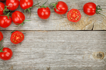 Cherry tomatoes on wooden table