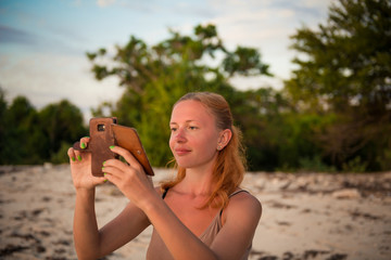 Young woman taking picture