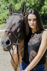 Obraz premium Young woman with a horse