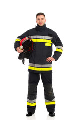 Firefighter posing with helmet under his arm
