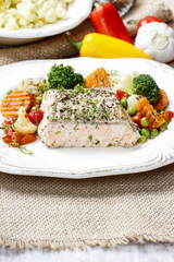 Salmon with herbs and vegetables