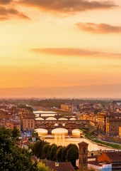Raamstickers Gouden zonsondergang over de rivier de Arno, Florence, Italië © gurgenb