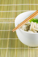 Bowl of Wonton on Natural Bamboo Place Mat