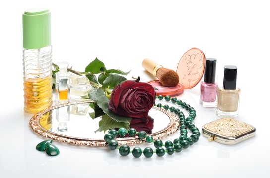 cosmetics makeup, jewelry, mirror and red flower