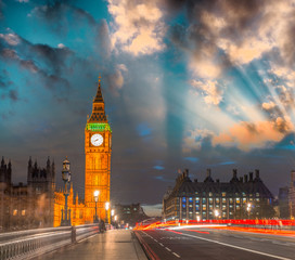 Fototapeta na wymiar Sunset sky and car light trails over Westminster Bridge in Londo