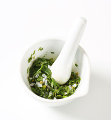 Fresh rosemary in a mortar © Viktor