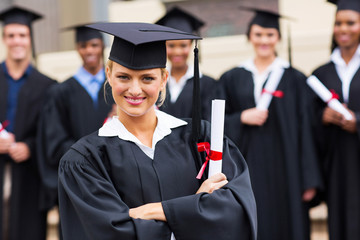 female college graduate with arms crossed