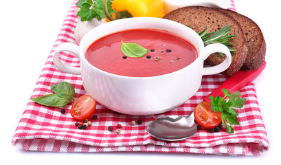 Tasty tomato soup and vegetables, close up