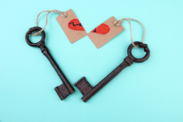 Keys to heart, Conceptual photo. On color background