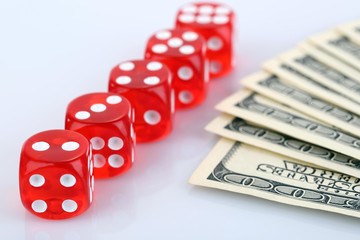 Red dices and money, isolated on white