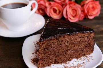 Delicious chocolate cake on table close-up